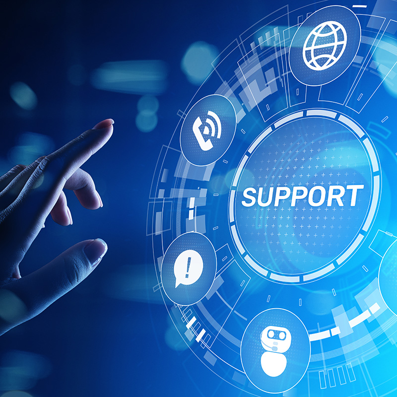 A hand extended to select a tech support option from a phosphorescent glowing UI display.